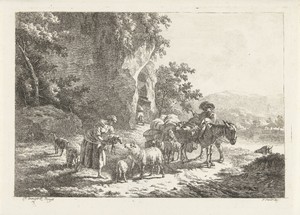 Herders met kudde nabij grot