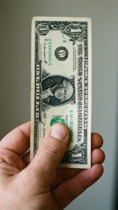 Holding a Dollar