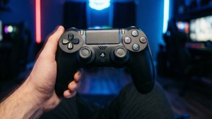 Holding PS4 Controller