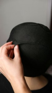 Holding the Cap