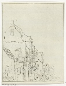 Huis met kruiwagen voor de deur