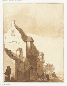 Huis met kruiwagen voor de deur