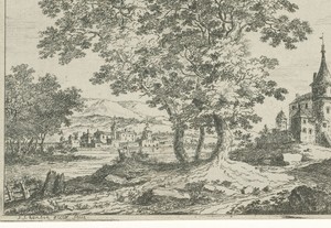 Huizen met torens aan een rivier