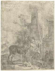 Jonge man met een paard bij een monument