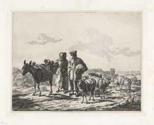 Man en vrouw met bepakte ezel