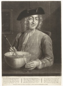 Man met een glas en een schaal
