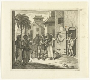 Man met tulband op het hoofd wordt de gevangenis binnengebracht