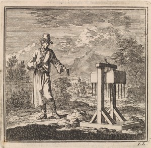 Man wijst op een mollenval