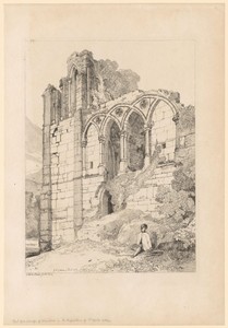 Man zit onder een venster van de ruïne van de Abdij van Rievaulx