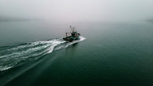 Misty Fishing Boat Wake