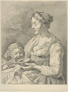 Moeder geeft haar kind te eten