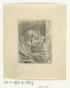 Monnik leest bijbel