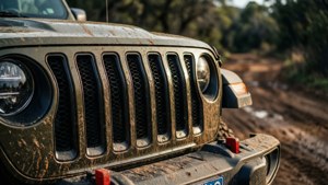 Muddy Jeep Grille Close-Up