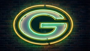 Neon Logo Brick Wall