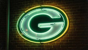 Neon Logo on Brick