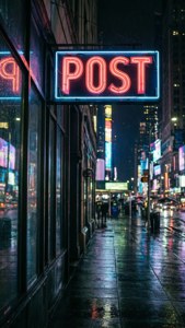 Neon POST Sign at Night