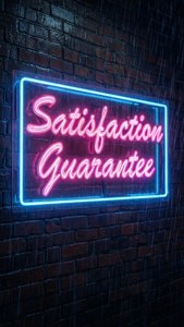 Neon Sign on Brick Wall