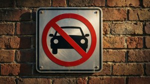 No Parking Brick Wall