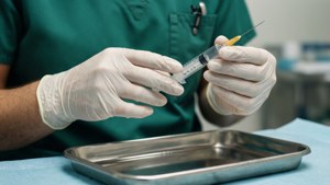 Nurse Preparing Injection