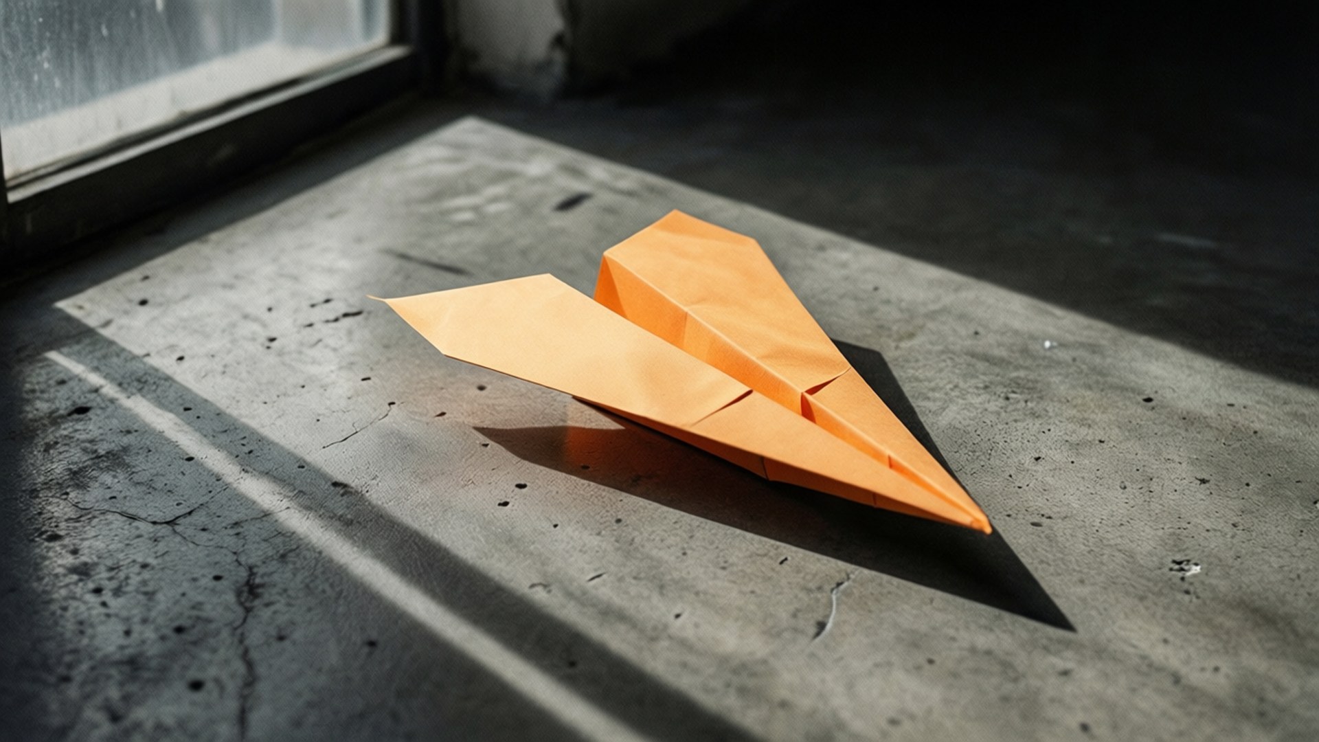 Orange Paper Plane by Wallpapers.art Studio