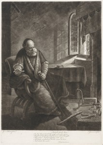 Oude man voor de haard