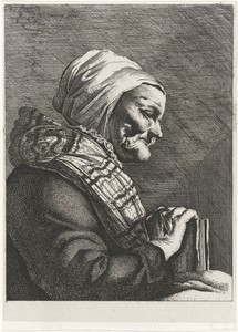 Oude vrouw met boek