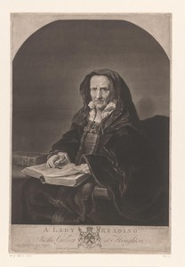 Oude vrouw met een boek
