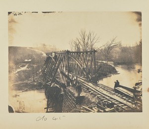Part of Construction Corps building new Military Truss Bridge across Bull Run, April 1863