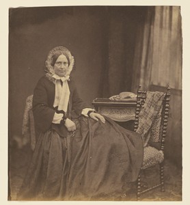 [Portrait of a woman, wearing a bonnet, seated]