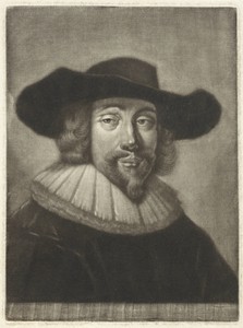 Portret van een man met een hoed en kraag