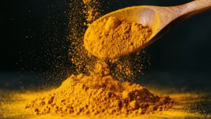 Pouring Turmeric
