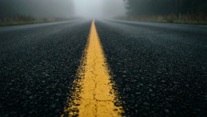 Road Dashes into Fog