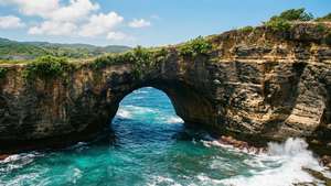 Rock Arch Over Turquoise Sea