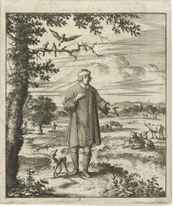Schrijver Willem Sluiter met een hond bij een beek