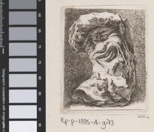 Sculptuur van een groteske kop