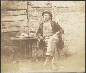 [Seated Man]