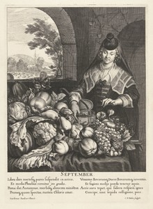September: Vrouw bij tafel overladen met groenten en fruit