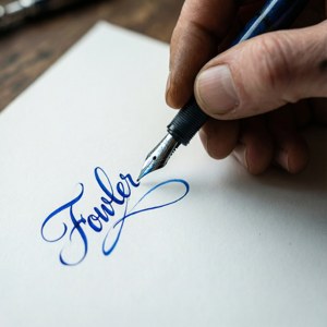 Signing His Name