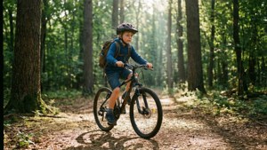 Son Cycling Through Forest