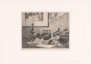 Spelende kat knoeit een inktpot over tafel