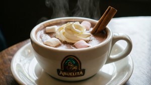 Steaming Cup with Whipped Cream