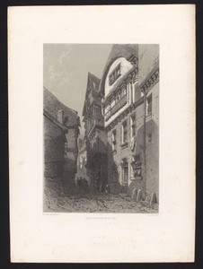 Steeg met huizen in de avondschemering