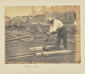 Straightening Slight Bends in Rails by Use of a Jackscrew