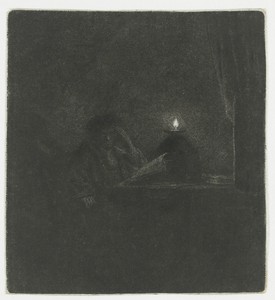 Student at a table by candlelight