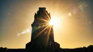 Sun Rays Behind Monument