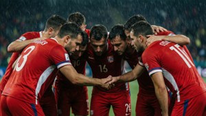 Team Huddle in Rain