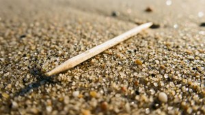 Toothpick on Sand