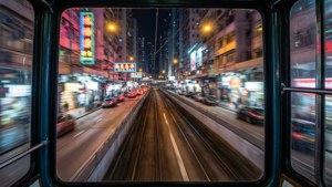 Tram Rush Through Neon