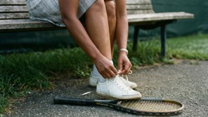 Tying Shoes Before Match