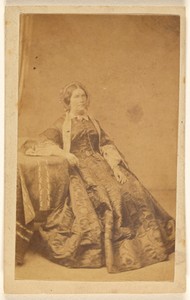 [Unidentified woman, seated]